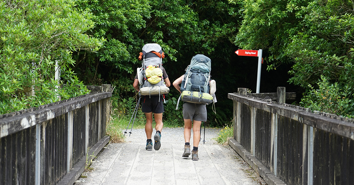 Hikers crossing Blacks Bridge Manawatū